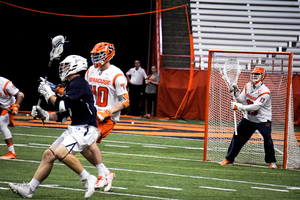 Syracuse redshirt senior goalie Evan Molloy came up with 15 saves to salvage SU's poor performance at the faceoff X. 